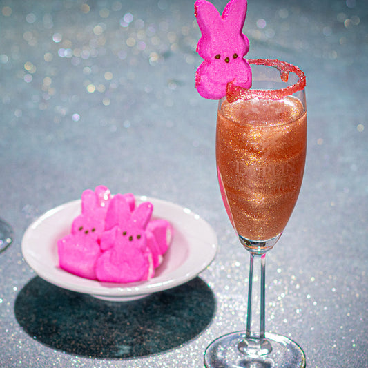 Inspired by Peeps. The Dupeepmosa is a mimosa that literally sparkles for Easter brunch cocktails.
