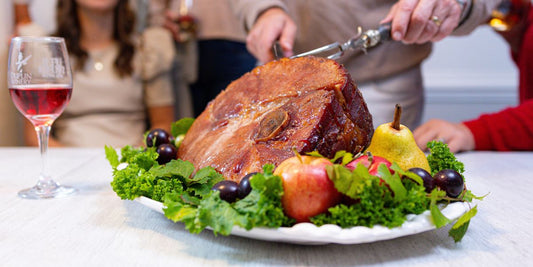 The perfect holiday glazed ham. Easy with a touch of wine and apricot.